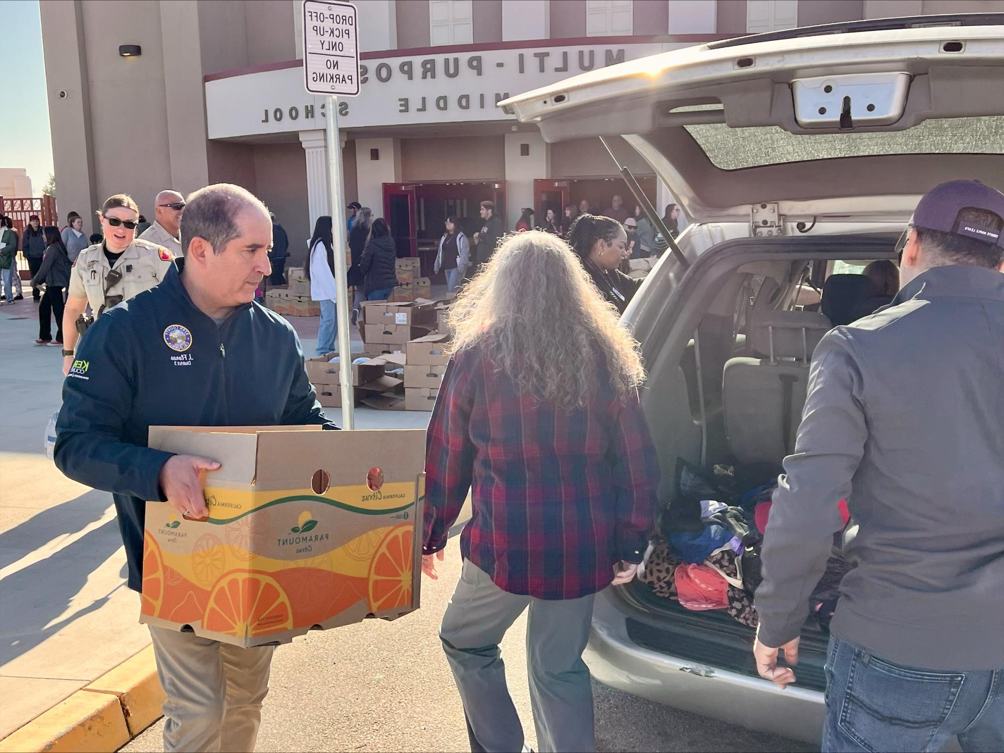 Serving at the Thanksgiving Basket Project at Standard Middle School, along with partners at Chevron and Bakersfield North Rotary.